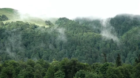 Boiling of Clouds Over the Mountain Pass. Timelapse Video stock 66276807