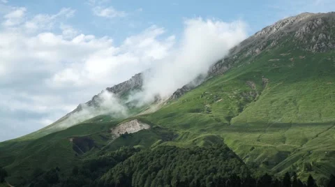 Boiling of Clouds Over the Mountain Pass. Timelapse Video stock 66276917