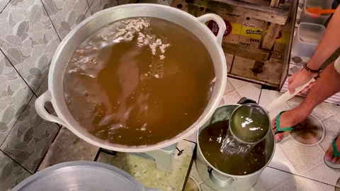 Boiling Coconut Water to Make Vla Kelapa. Coconut Custard Sauce Process Stock-Footage 336890509