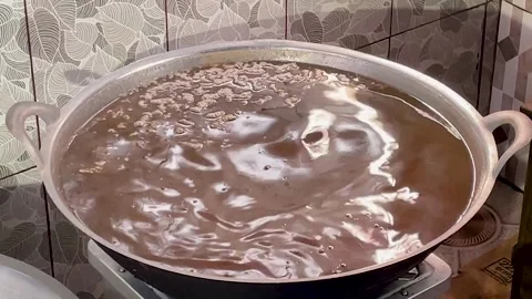 Boiling Coconut Water to Make Vla Kelapa. Coconut Custard Sauce Process Video stock 336890518