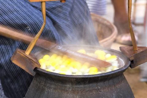 Boiling cocoon in a pot Stock Photos