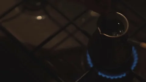 Boiling coffee on a gas stove Stock Footage 73071373