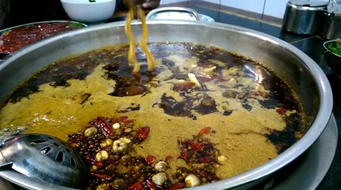 Boiling duck intestines in a hot pot, so called huoguo Stock Footage 44463717
