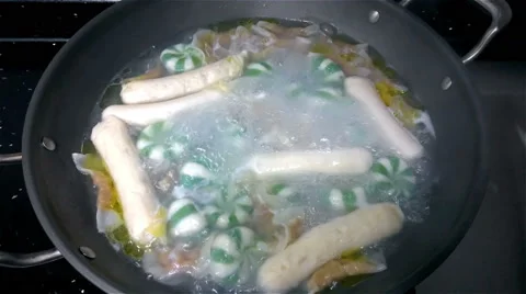 Boiling dumpling and sausage at home 4K Stock Footage 59509553