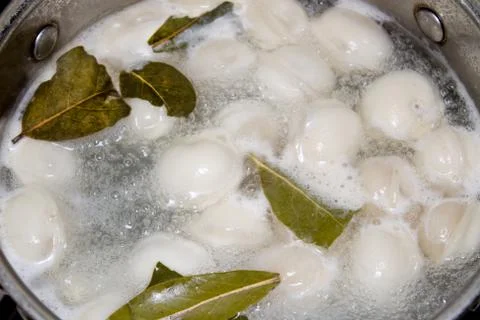 Boiling dumplings in the pan Stock Photos