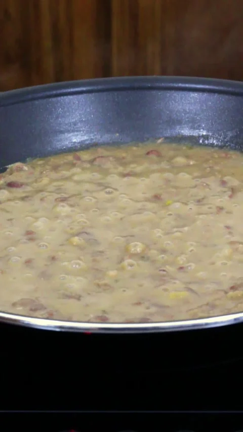 Boiling, easy and delicious refried beans recipe. Stock Footage 281575287