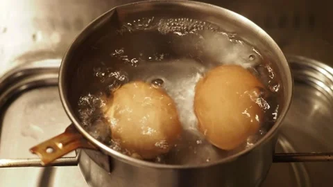 Boiling eggs Stock Footage 140990699