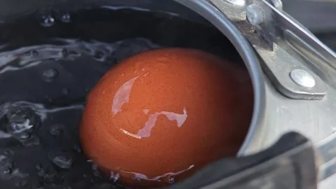 Boiling eggs on a gas stove. Stock Footage 306759704