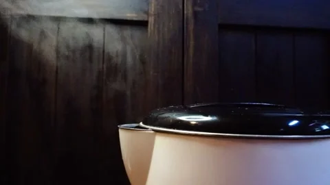 Boiling Electric Kettle Creates Gusts of Steam, High-angle CU, HD Stock Footage 219770855