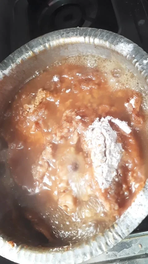 Boiling Finger Millet Dough with Bubbling Mixture During Flatbread Preparation Stockbeeldmateriaal 339449866