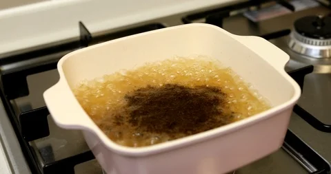 Boiling flannel filter in boiling water with ground coffee Stock Footage 117693670