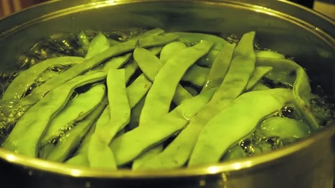 Boiling green bean pods Stock Footage 120385759