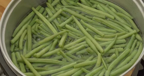Boiling green string beans closeup selective focus Stock Footage 138452170