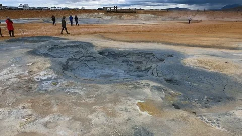 Boiling grey mud pots in Hverir, part of Myvatn Geothermal Area in Iceland Stock Footage 221872157