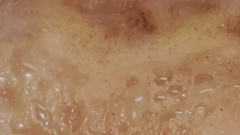 Boiling Hot Brown Sauce Bubbling Macro Video Clip Stock Footage 331765179
