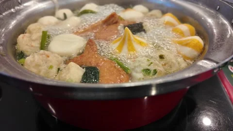 Boiling hot pot with assorted ingredients video frame Stock Footage 325650259