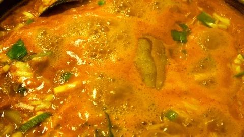 Boiling hot pot type of Korean stir-fried rice cakes, Jeukseok-tteok-bokki, 4K Stock Footage 97549837