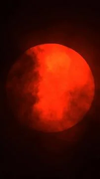 Boiling hot sun and clouds Stock Photos