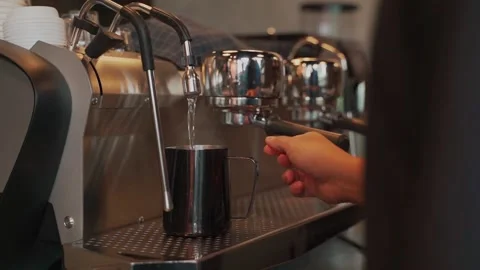 Boiling hot water pouring from automatic boiler of espresso coffee machine. bari Stock Footage 159401770