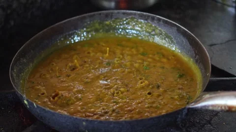 Boiling Indian Curry in Pan Close-Up View Stock Footage 333594697