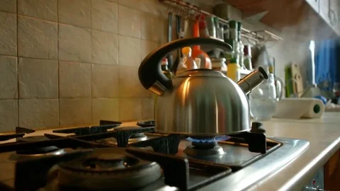 Boiling kettle and mug Stock Footage 74712544