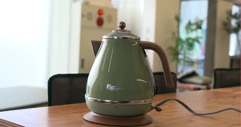 A boiling kettle of work tools in office Stock Footage 122088584