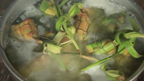 Boiling Ketupat in a pot Video stock 276715449