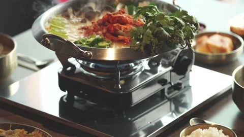 Boiling Korean Beef Hot Pot in Cooking Pot Stock Footage 334697695
