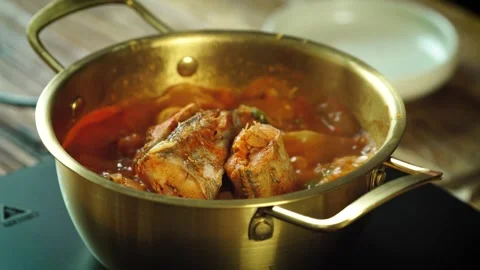 Boiling Korean Pollock Stew Simmering in Hot Pot Close Up Stock Footage 335732779
