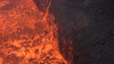 Boiling lava lake inside Marum Volcano, Vanuatu Stock Footage 106766137