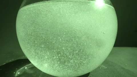 Boiling Light Green Bubbles Are Fully Veiled All the Water in a Glass Vessel Stock Footage 61313192