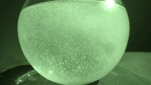Boiling Light Green Bubbles Are Fully Veiled All the Water in a Glass Vessel Stock Footage 76389590