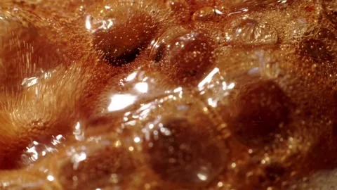 Boiling liquid caramel Stock Footage 150877123