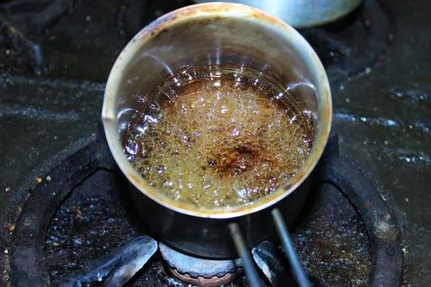 Boiling liquid in a saucepan Stock Photos