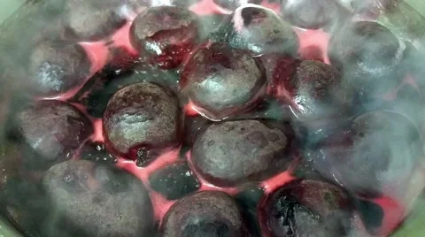 Boiling a lot of purple beetroots, inside a pot, at a restaurant kitchen Stock Footage 59542659
