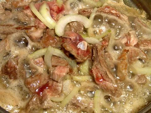 Boiling meat dish close view culinary background Stock Photos