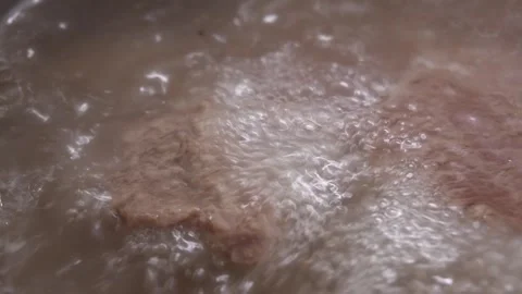 Boiling Meat in Pot. Stock Footage 255664349