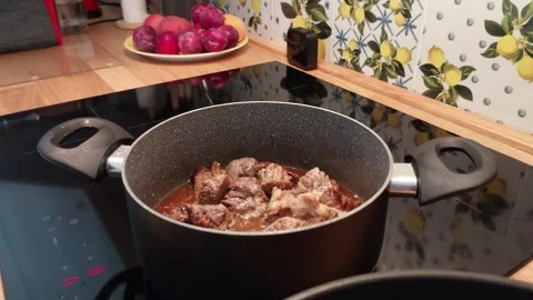 Boiling Meat in Soft Light: A Quiet Moment of Kitchen Preparation 스톡 동영상 314100200
