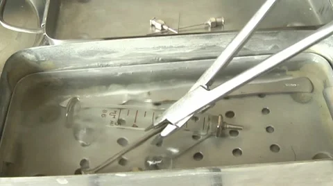 Boiling medical instruments before use Stock Footage 10789974