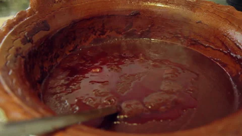 Boiling Mole negro in a clay pot 25 Stock Footage 135892425