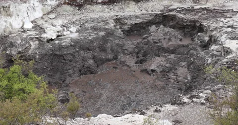 Boiling mud and water of a Fumarole crater,Wai-O-Tapo thermal park, Rotorua Stock Footage 141600703