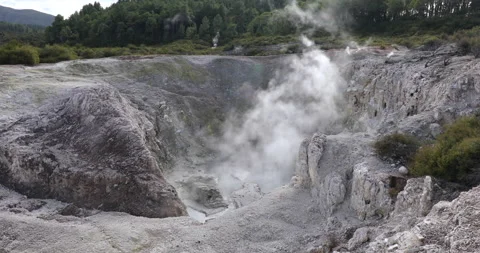 Boiling mud and water of Fumarole crater at Wai-O-Tapo Thermal Park,Rotorua Stock Footage 141604791