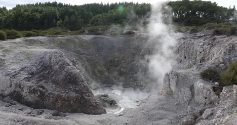 Boiling mud and water of Fumarole crater at Wai-O-Tapo Thermal Park,Rotorua Stock Footage 141606116