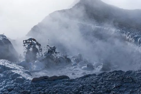 Boiling mud of fumaroles Stock Photos