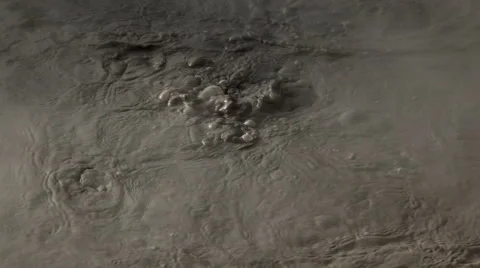 Boiling mud pool in New Zealnd with smoke and bubbles Stock Footage 52371993