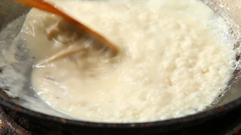 Boiling mushroom soup in pan, in door  Chiangmai  Thailand Stock Footage 133554053