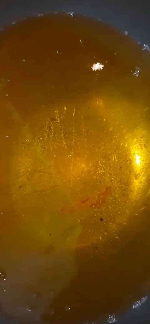 Boiling Oil Murukku Preparation Capturing the Crispy Frying Process Stock Footage 284315181