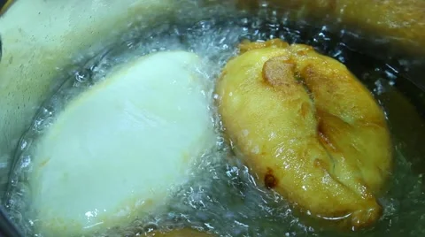 Boiling oil. The process of preparing fast food Stock Footage 61453952