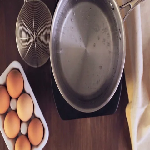 Boiling organic eggs for deviled eggs recipe. Video stock 69729790