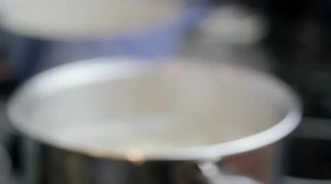 Boiling pan in and out of focus Stock Footage 12728939